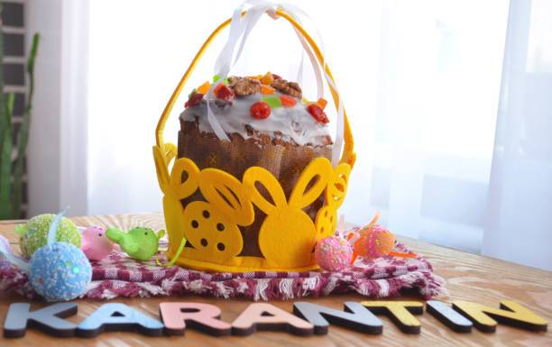 easter cake and eggs, close up. virus protection. quarantine for easter. the concept of the celebration of holy easter 2020 during the coronavirus pandemic. - mask religious celebration horizontal easter imagens e fotografias de stock