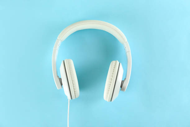 istock Conceptual image of white headphones on bright colorful background. 1220355012