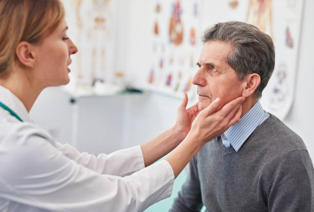 istock Senior man during routine examination at the doctor 1220355488