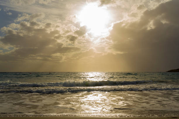 istock The sea and clouds covered the sun. 1220360208