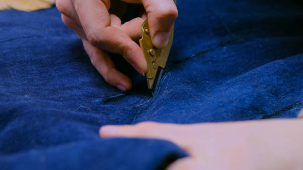 istock Skinner working with beaver fur skin 1220365109