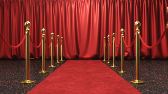 Awards show background with closed red curtains. Red velvet carpet between golden barriers connected by a red rope. Curtains theater stage. 3d Rendering
