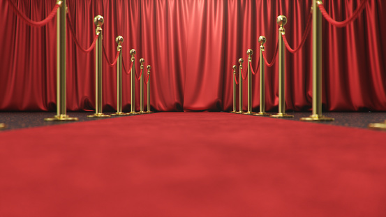Awards show background with closed red curtains. Red velvet carpet between golden barriers connected by a red rope. Curtains theater stage. 3d Rendering