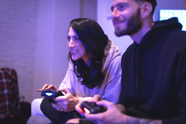 istock Couple Play Videogame at Home 1220369145