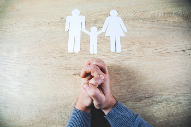 istock man praying for family 1220369527