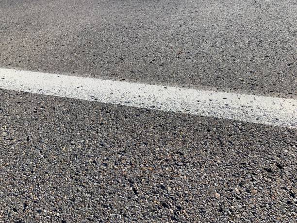 istock White Line on Asphalt Street 1220374298