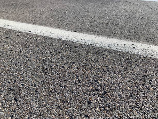 istock White Line on Asphalt Street 1220374314