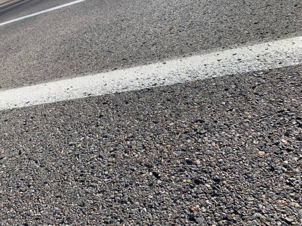 istock White Line on Asphalt Street 1220374366