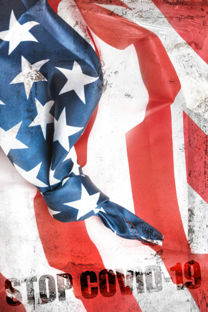istock American flag with message Stop COVID-19 1220375998