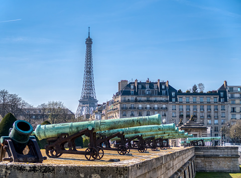 Cannons outside Les Invalides with The Eiffel Tower in background - Paris, France