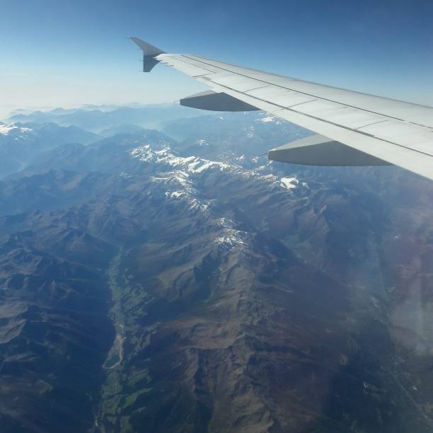 istock View from the plane over the Alps. 1220380041
