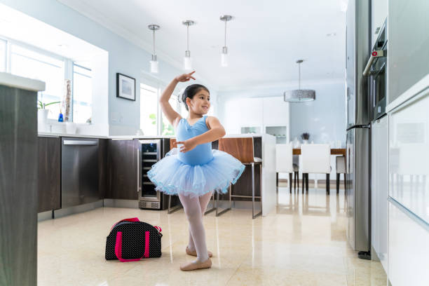 istock Putting my tutu for ballet home lessons 1220381359