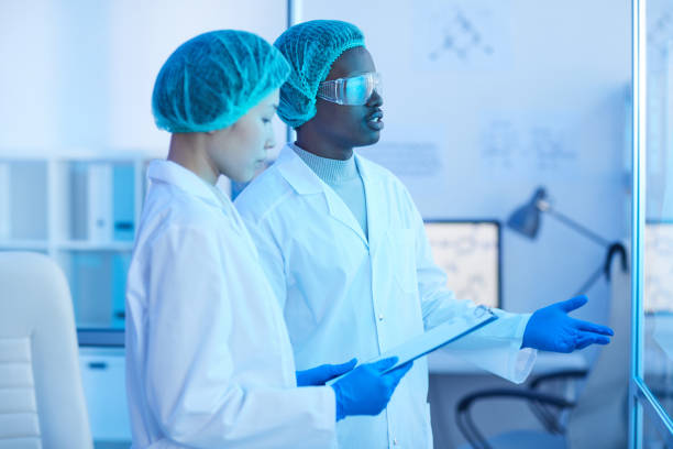 istock People working in team at hospital 1220382154