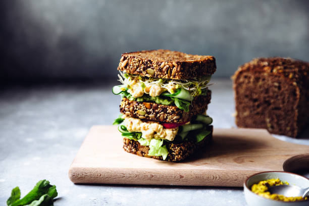 istock Super vegan sandwich served on table 1220390441