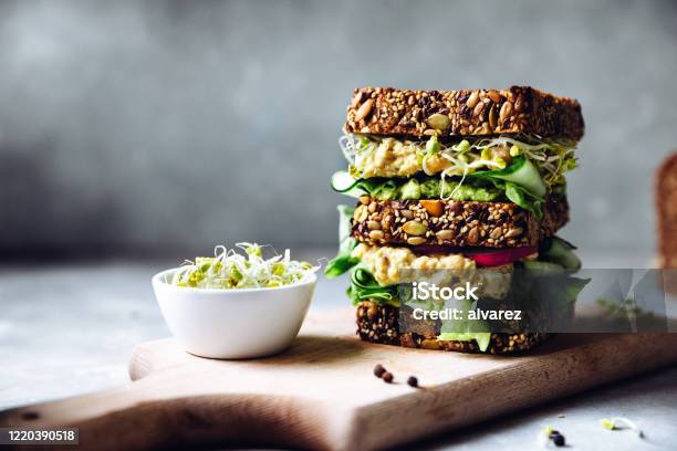 Vegan Super Sandwich Served With Sprouts Stock Photo - Download Image Now - Healthy Eating, Sandwich, Food