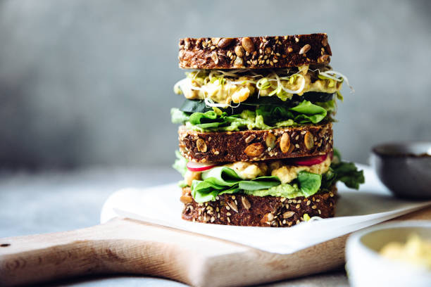 istock Super vegan sandwich served on a table 1220391140