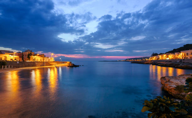 View from Santa Maria al Bagno in Italy (Puglia) After sunset sea view from Santa Maria al Bagno in Puglia region in south Italy. Photo taken with Canon 5D Mark IV. taranto stock pictures, royalty-free photos & images