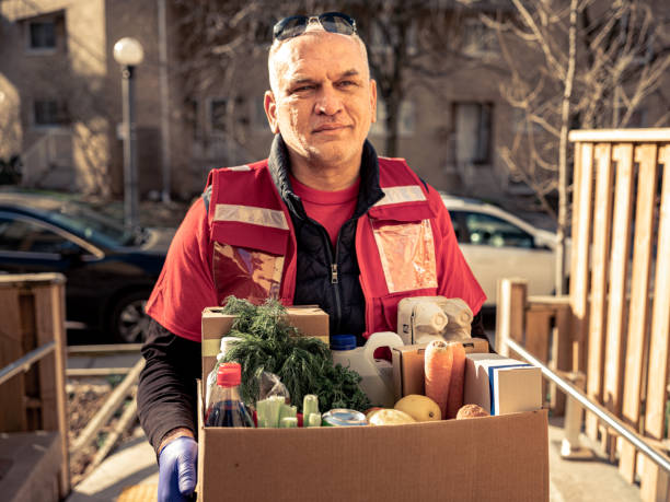 istock COVID-19, Donation Home food delivery during lockdown 1220397834