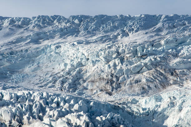 istock View up a rugged glacier and crevasse field 1220398958