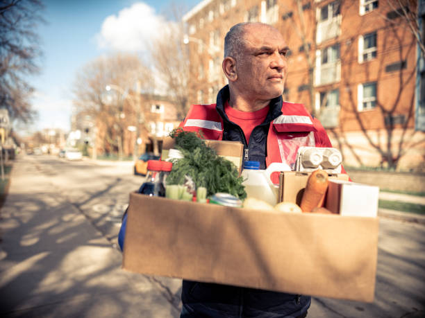 istock COVID-19, Donation Home food delivery during lockdown 1220400142