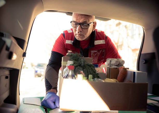 istock COVID-19, Donation Home food delivery during lockdown 1220400257