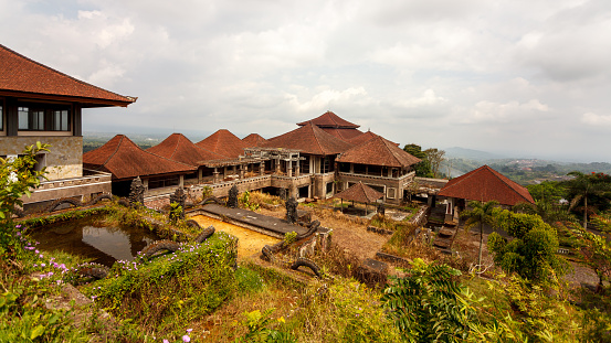 The territory of an abandoned hotel Bedugul Taman Rekreasi Hotel & Resort on Bali in Indonesia