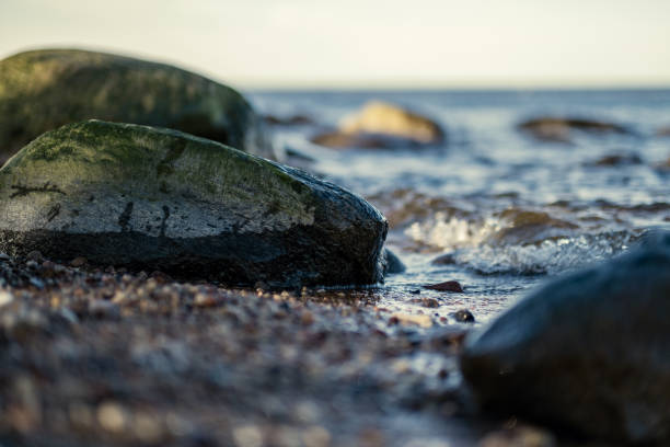 istock waves crushing on the rocks on beach 1220407012