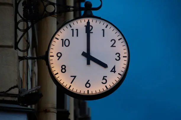 Photo of Street clock showing four hours