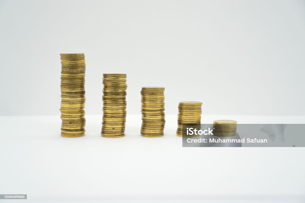 Coin Stack Shrinking Stack Of Coin Showing Decrease Graph On White Background Stock Photo ...