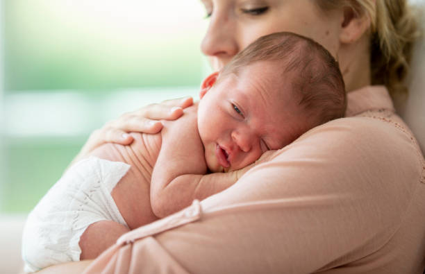 istock Mother and newborn son 1220409699