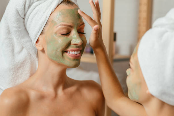 istock Facial treatment with daughter 1220409714