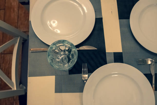 istock Clean dishes and appliances on the tablecloth in a cafe. 1220409754