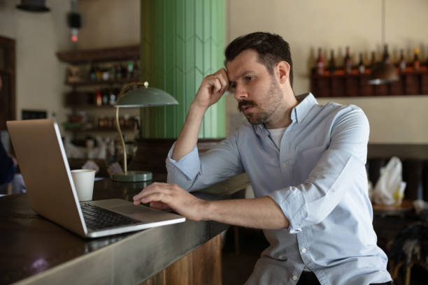 istock Restaurant, cafe, bar closed due to COVID-19 or Coronavirus outbreak lockdown, stressed owner of small business trying to find solution 1220409842