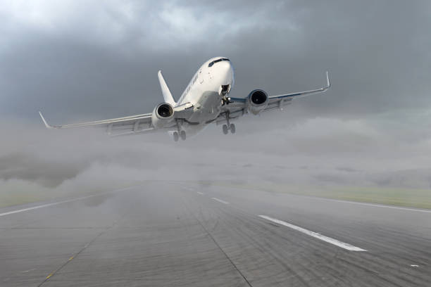 Passenger airplane leaving for the second go around, after an unsuccessful attempt to landing in bad weather, low visibility in the fog.