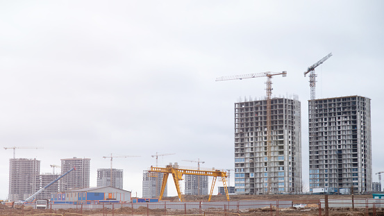 construction site, construction of a new area, construction cranes