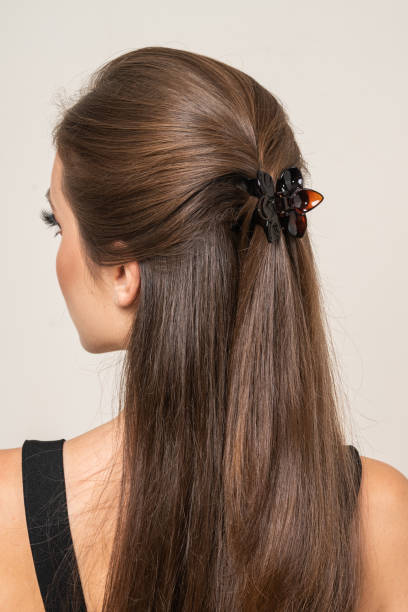 istock Woman With Hair Clips 1220413213