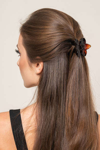 istock Woman With Hair Clips 1220413227