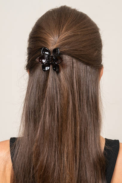 istock Woman With Hair Clips 1220413234