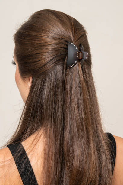 istock Woman With Hair Clips 1220413291