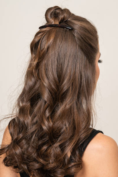 istock Woman With Hair Clips 1220413292