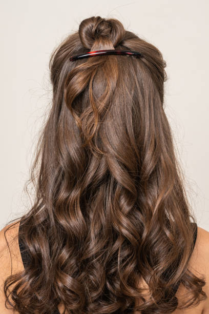 istock Woman With Hair Clips 1220413362