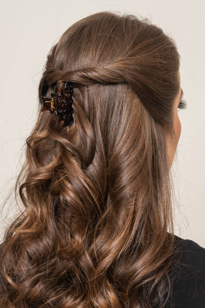 istock Woman With Hair Clips 1220413375