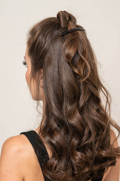 istock Woman With Hair Clips 1220413398