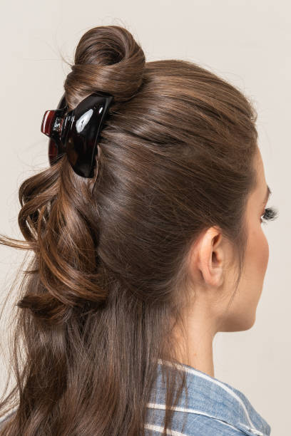 istock Woman With Hair Clips 1220413405