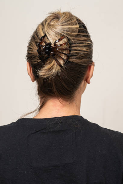 istock Woman With Hair Clips 1220413461