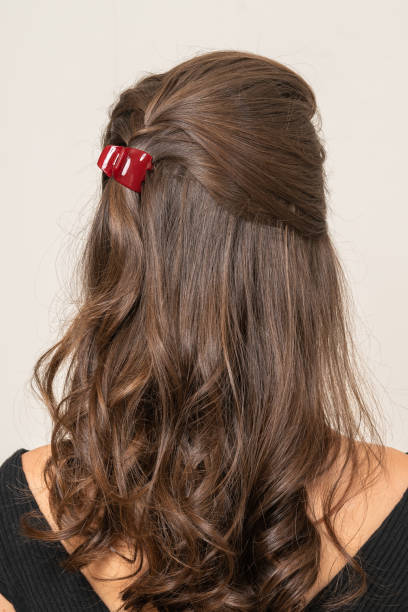 istock Woman With Hair Clips 1220413498