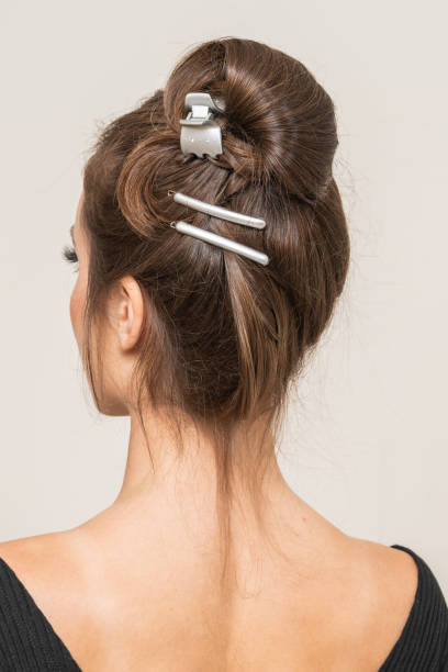 istock Woman With Hair Clips 1220413521