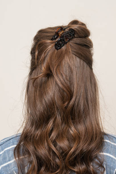 istock Woman With Hair Clips 1220413526