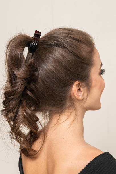 istock Woman With Hair Clips 1220413554