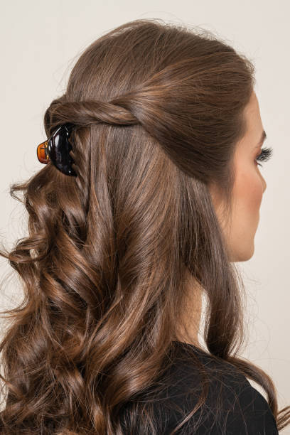 istock Woman With Hair Clips 1220413574